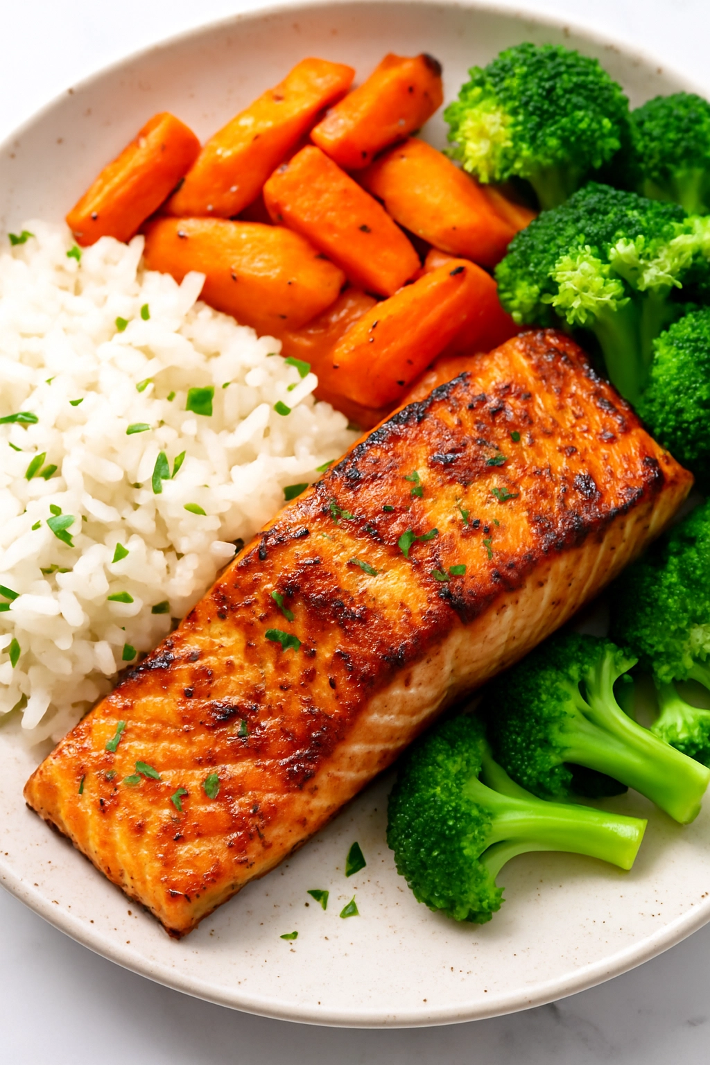 “Grilled Salmon with Roasted Carrots, Rice and Steamed Broccoli”